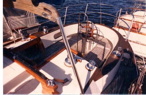 The Baba 35 features a nice sized cockpit complete with teak decks that
grace most of the boats. Notice the boom gallow in the foreground that is present
on some of the…