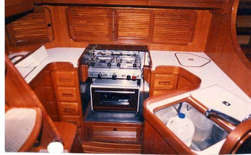 This is the galley of the Baba 35. Efficiently designed with Formica
counter tops and plenty of storage, it's a pleasure to prepare meals and entertain guests.