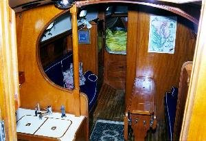This picture is taken looking down into the salon of a Baba 30 from the
companionway. A 6'4" cabin height is a characteristic of the Baba 30 that is
appreciated by many…